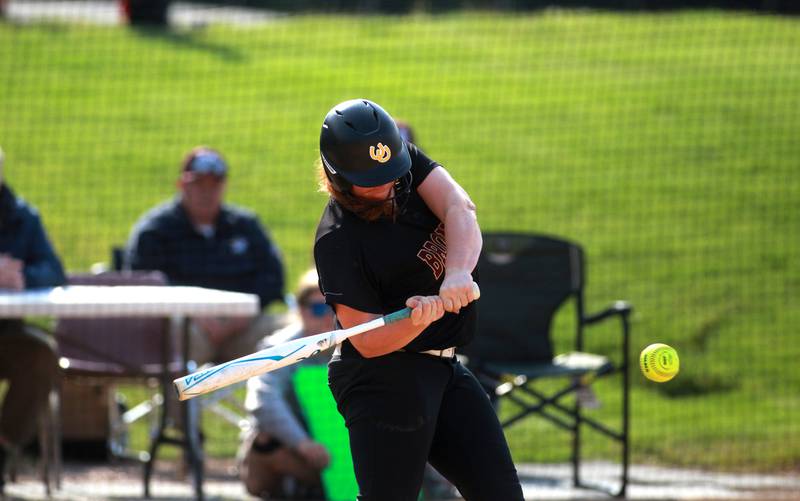 Montini’s Aubry Raffen makes contact during a Class 3A Benedictine Supersectional against St. Laurence on Monday, June 9, 2025 in Lisle.