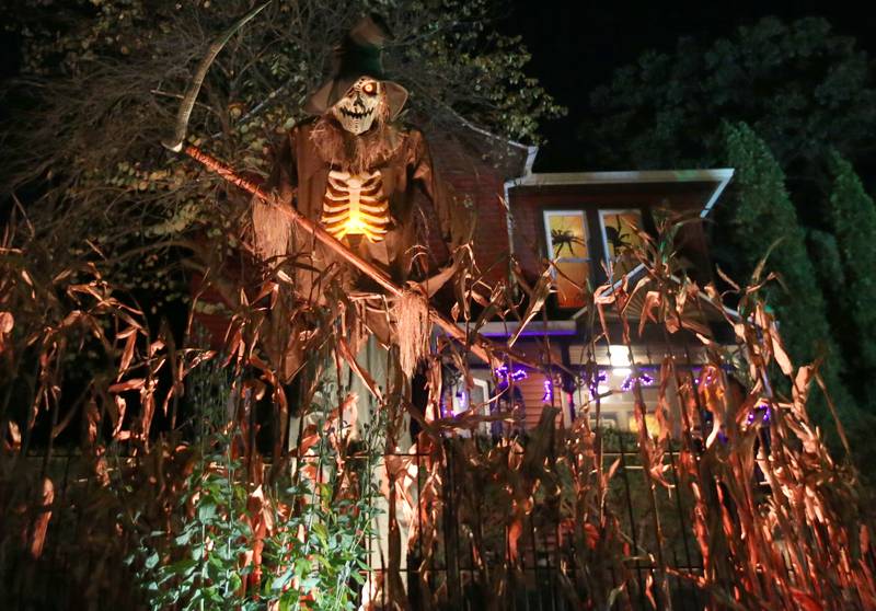 A Halloween headless horseman cover a home in the 800 block of Ottawa Avenue on Thursday, Oct. 17, 2024 in Ottawa.