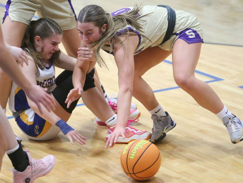 Serena's RayElle Brennan rolls a loose ball away from Somonauk/Leland's Ashley McCoy on Monday, Feb. 10, 2025 at Somonauk High School.