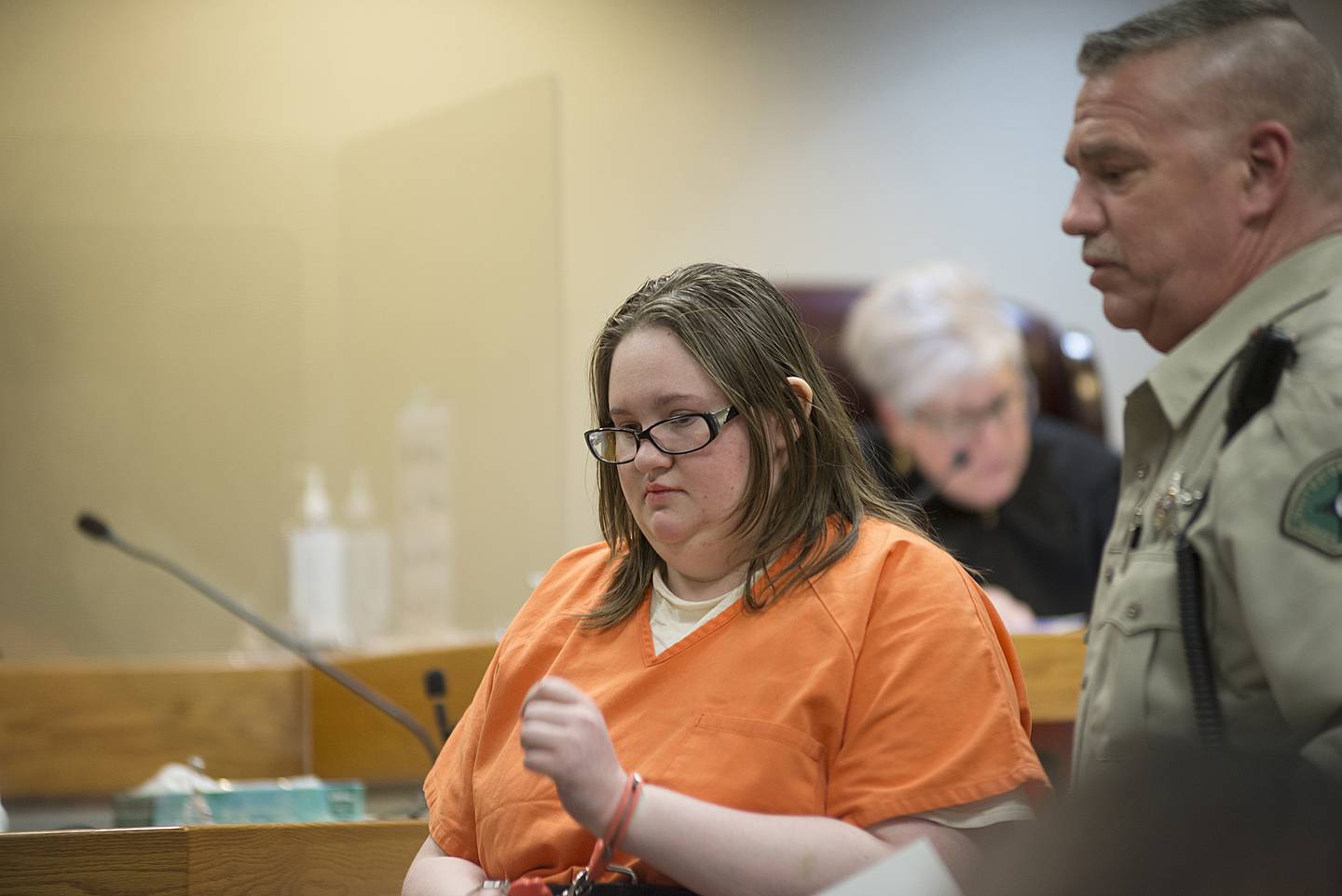 Rachel Helm is escorted out of the Whiteside County courtroom Wednesday, March 9, 2022 after agreeing to a plea deal in the death of Peggy Schroeder. For her part in the death Helm received 11 and half years in prison.