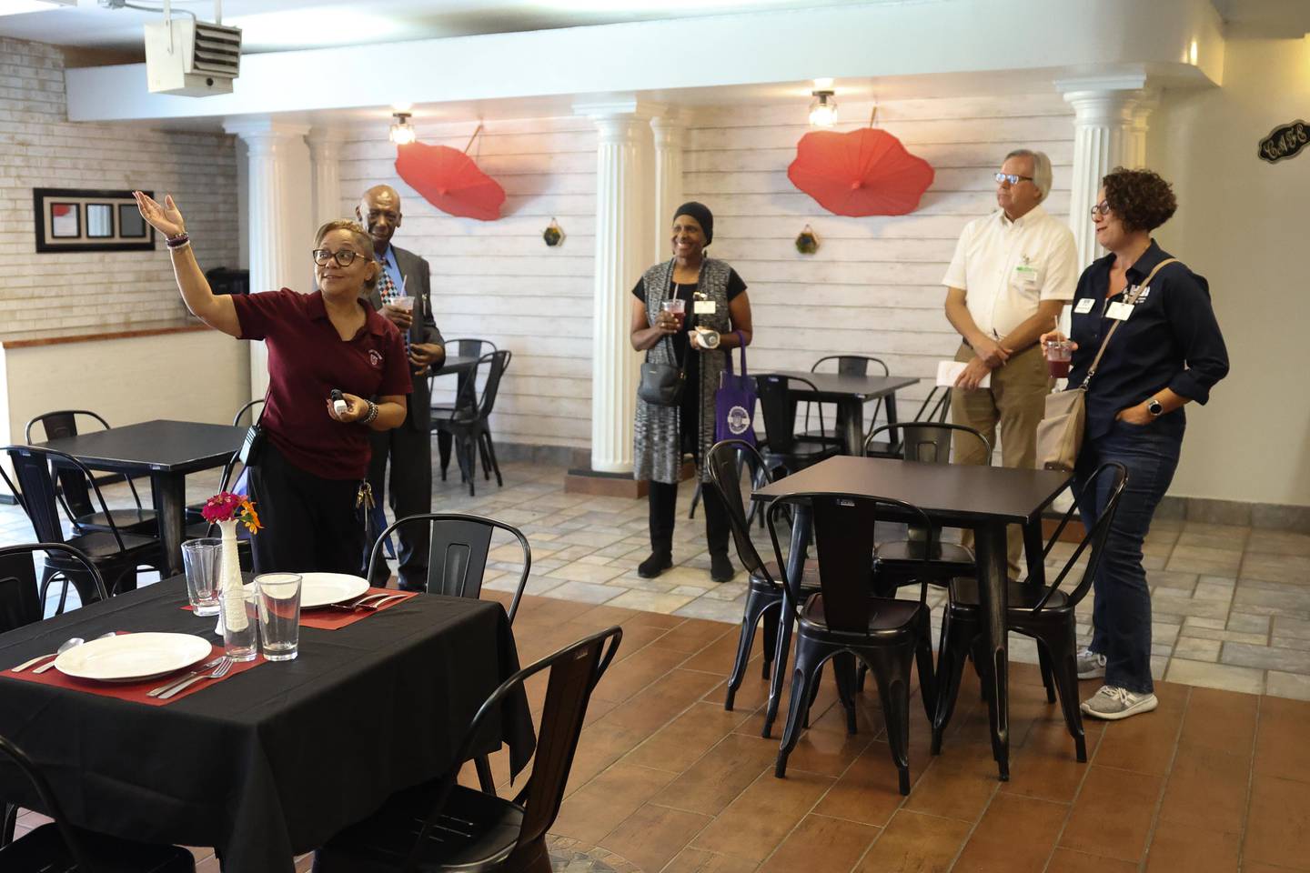 Culinary instructor Elaina Alexander, left, gives a tour of the center fully functioning restuarant at the Joliet Job Corps 60th anniversary open house on Thursday, August 29, 2024 in Joliet.