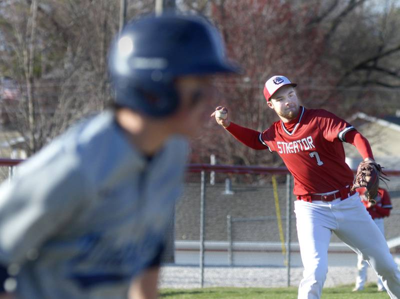 Streator 3rd baseman fields a ground ball then hurries a throw to 1st base to put out a Plainfield runner in the 4th inning Tuesday at Streator.