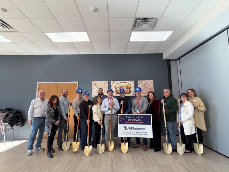 Surf Internet and the Village of Minooka officials celebrate a ceremonial groundbreaking for Surf’s expansion into Minooka. The event was held indoors due to cold temps, but was still warmly celebrated.