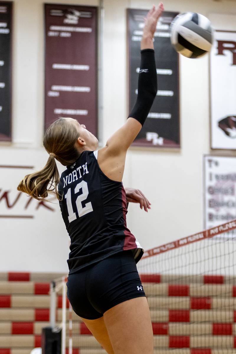 Plainfield North's Kayla Overbeek attempts a spike against Morris during a varsity volleyball home game on Sept. 2, 2025.