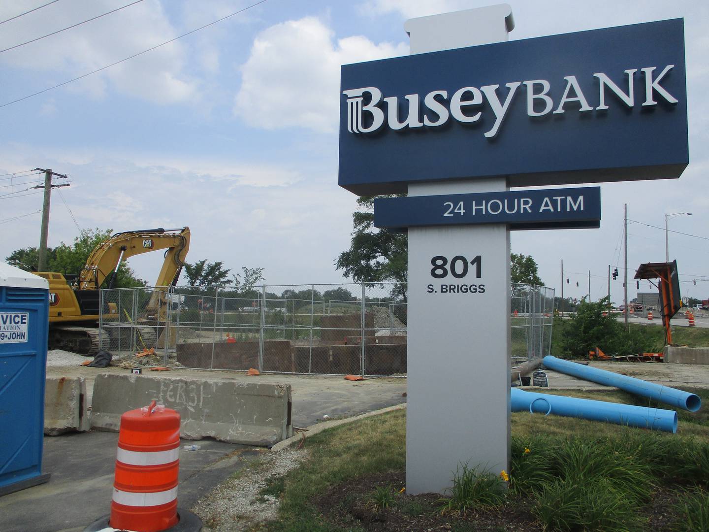Infrastructure construction for Joliet water and sewer service at a future Love's truck stop is seen near the Busey Bank branch on Briggs Street on July 8, 2025.