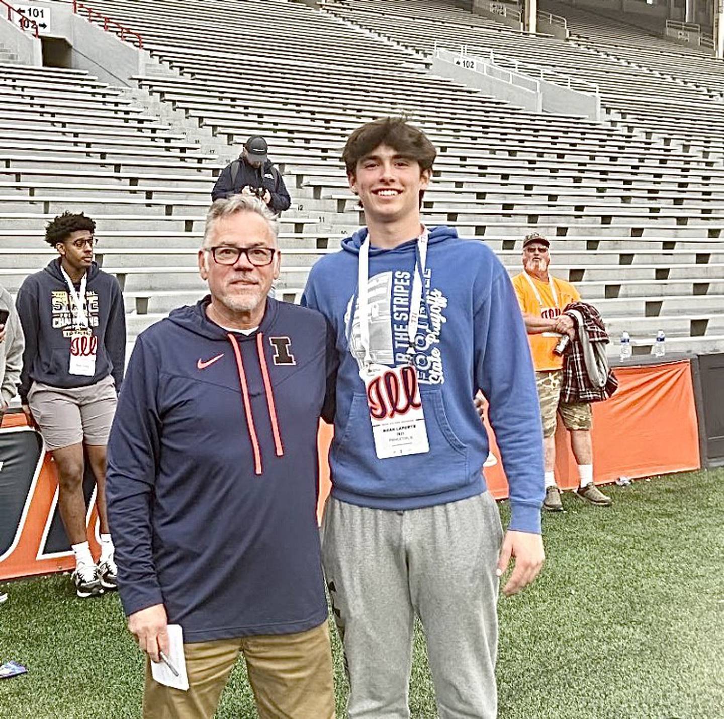 Princeton High School sophomore Noah LaPorte was a guest of Pat Ryan (left), the University of Illinois' Director of Illinois High School Relations, at the Fighting Illini's spring game.