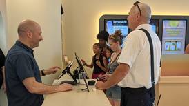 Smiles abound during soft opening for Candy Cloud store in Oswego