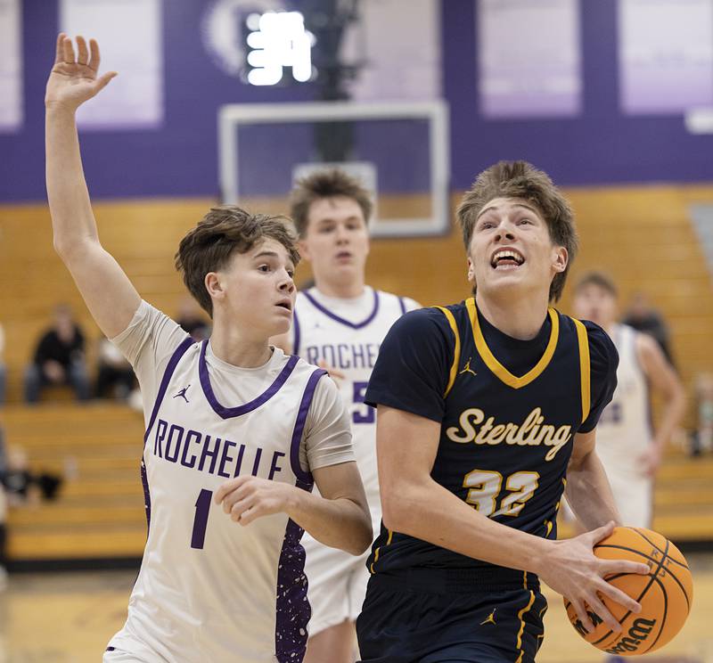 Sterling’s Jack Saathoff goes to the hoop against Rochelle’s Cohen Haedt Saturday, Jan. 3, 2026.