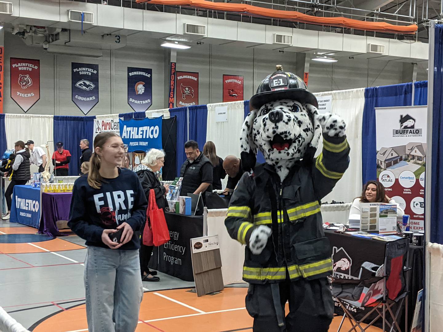 Pumper, the Oswego Fire Protection District’s mascot dog, greeted people as they walked around the Oswego Hometown Expo at Oswego High School on Saturday, Feb. 28, 2026.