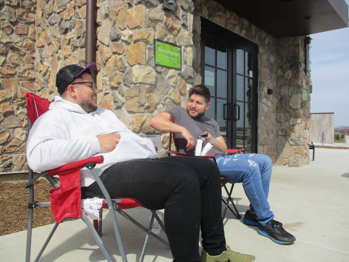 Sebastian Escudero (left) of Lockport and friend Rene Villanueva of Crest Hill arrived early Monday morning to be the first two customers at the Olive Garden restaurant that opened in Joliet on April 10, 2023.