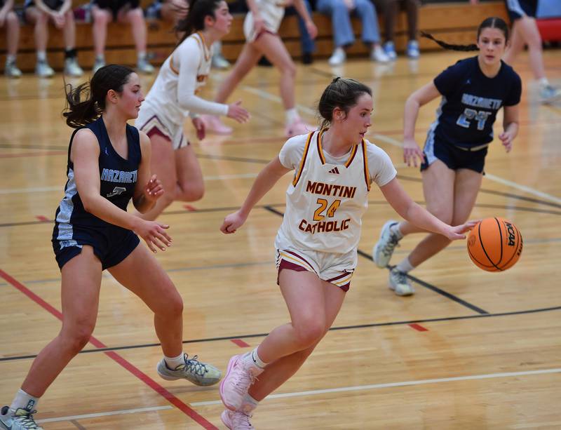 Montini’s Peyton Farrell (24) takes control of a loose ball in front of Nazareth’s Samantha Austin (left) during a Coach Kipp Hoopsfest game on January 20, 2025 at Benet Academy in Lisle.