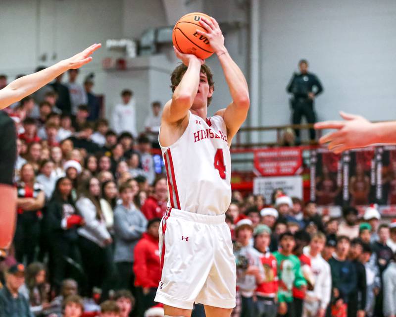Hinsdale Central's Vince Buzelis (4) shoots a jumper during their basketball game between Glenbard West at Hinsdale Central, Friday  Dec 6, 2024  in Hinsdale.