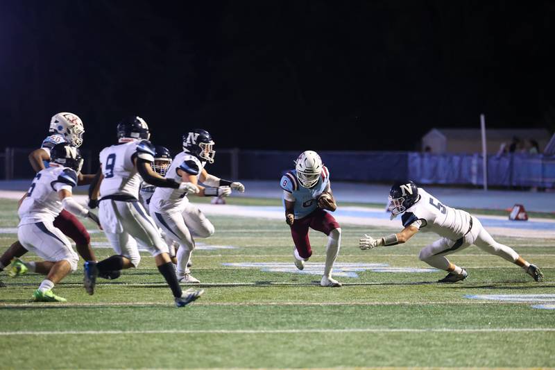 Nazareth defenders close in on Kankakee's Kymani Billings during Kankakee's 33-12 loss to Nazareth on Friday, Aug. 29, 2025.