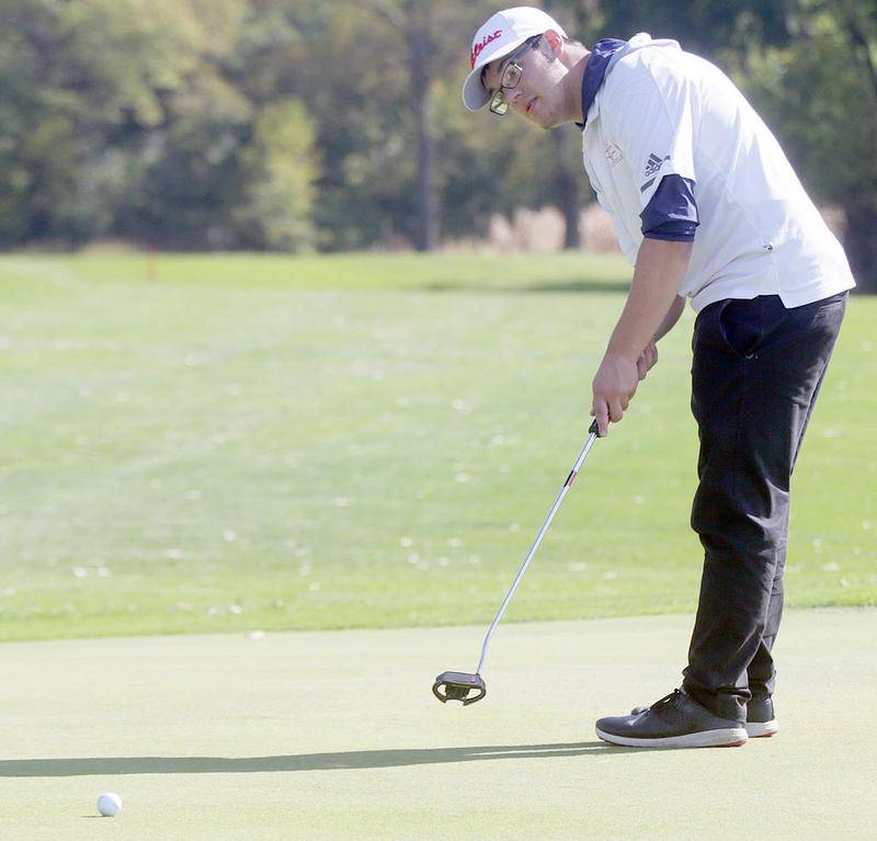 Hall's Rivers Jordan putts during Wednesday's Class 1A sectional boys golf meet at Spring Creek Golf Course in Spring Valley.