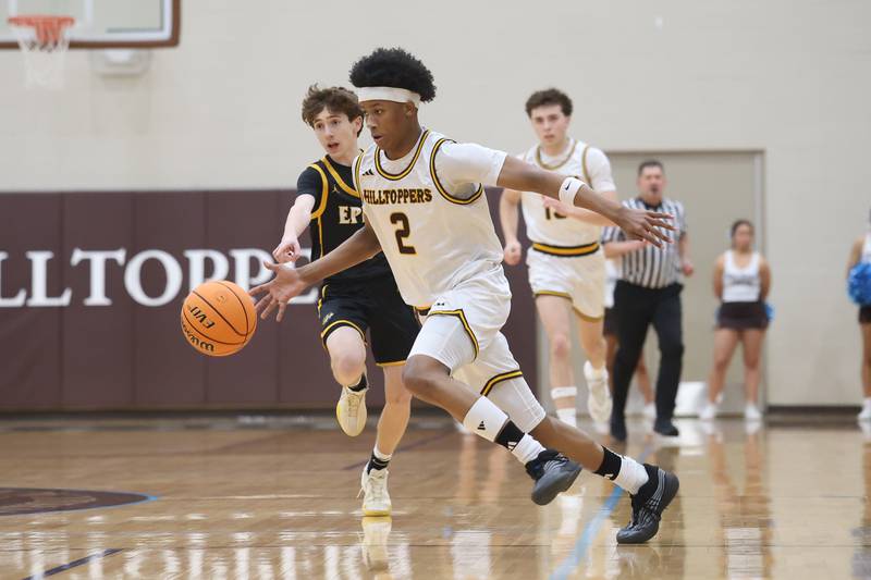 Joliet Catholic’s Donavyn Simmons drives to the paint against Elmwood Park in the Class 3A Joliet Catholic Regional semifinal game on Wednesday, Feb. 25, 2026 in Joliet.