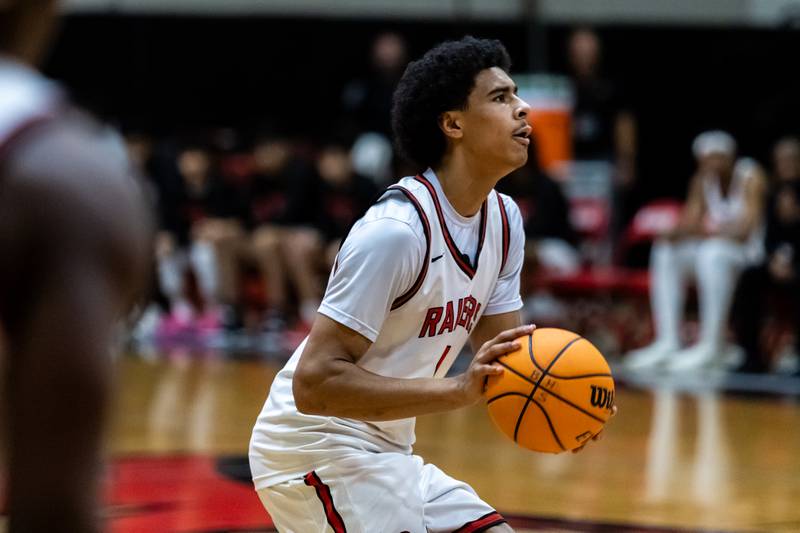Bolingbrook's Brady Pettigrew prepares to shoot during a varsity boys basketball game against Oswego East at Bolingbrook on Dec. 12, 2025.