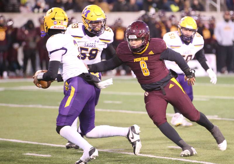 Montini Catholic's Nicky Castaldo chases after Monticello quarterback Ike Young during the Class 3A State football championship on Friday, Nov. 29, 2024 at Hancock Stadium in Normal.
