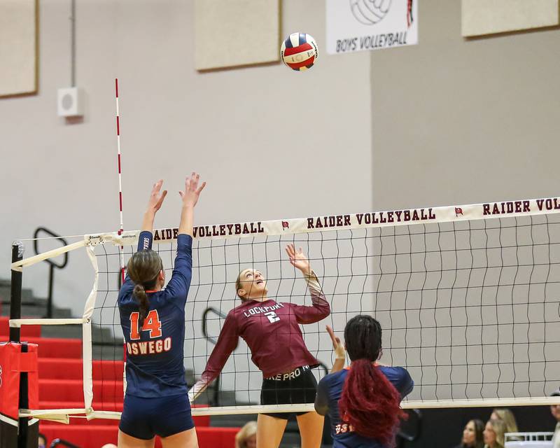 Lockport's Emily Mcgraw (2) leaps to spike during Class 4A Bolingbrook Sectional final match between Lockport at Oswego.  Nov 7, 2024  in Bolingbrook.