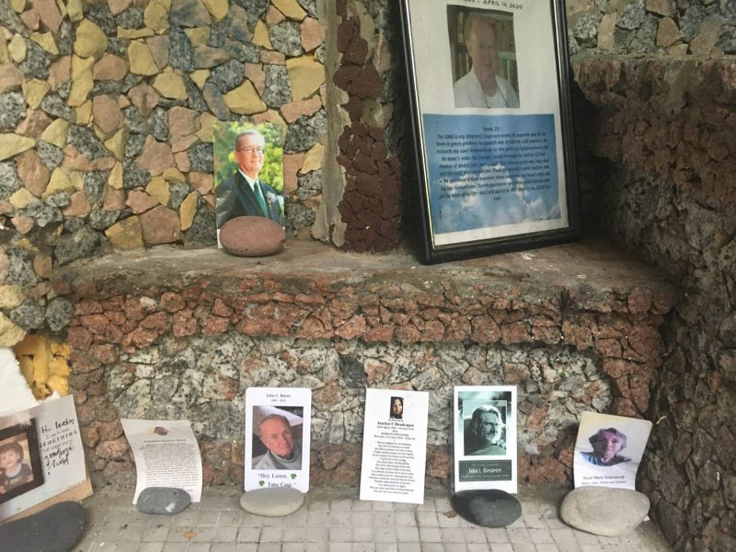 People leave memorials to loved ones at the Grotto Shrine behind the Kane County Government Center. Bob McQuillan will lead tours to the Grotto during the Geneva Arts Fair July 23 and 24, from a religious art display and sale at The Catholic Corner, 4 S. Sixth St., Geneva.