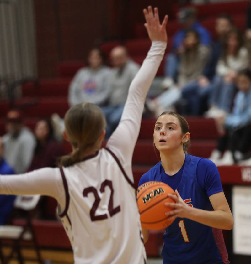 Genoa-Kingston's Presley Meyer shoots the ball against Marengo's Sophie Hanson during an IHSA Class 2A Marengo Regional semifinal girls basketball game on Monday, Feb. 16, 2026, at Marengo High School.