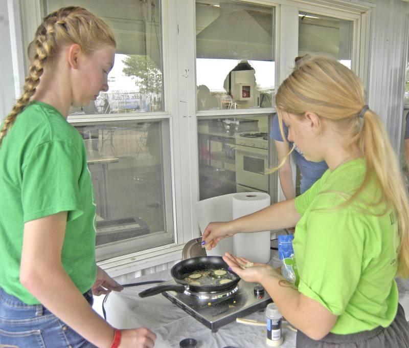 Evelyn Sims and Lillian Sanderon compete in the Culinary Creations Cook-Off at the fair. Fair action at the Lee County Fair concluded with events Sunday, July 27, 2025.