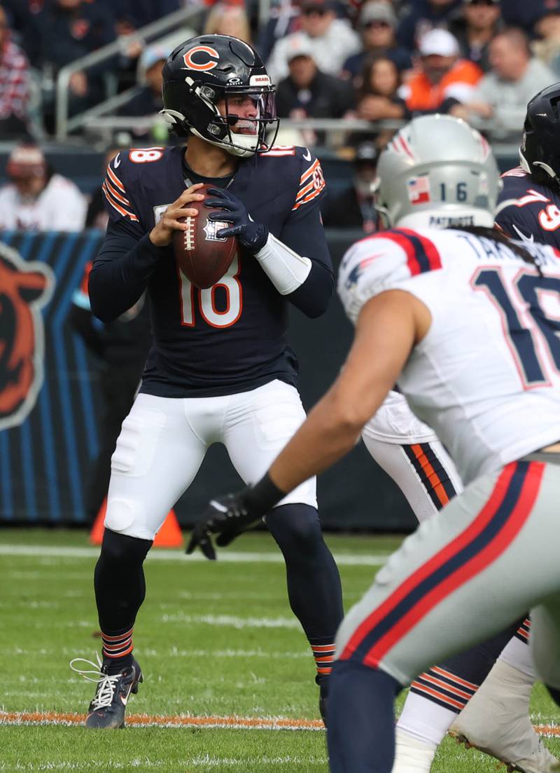 Chicago Bears quarterback Caleb Williams looks for a receiver in the Patriots secondary during their game Sunday, Nov. 10, 2024, at Soldier Field in Chicago.
