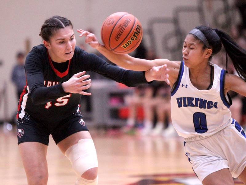 Barrington’s Gwen Adler (left) and Geneva’s Rilee Hasegawa go after a loose ball during the Class 4A Schaumburg Supersectional on Monday, Feb. 27, 2023.