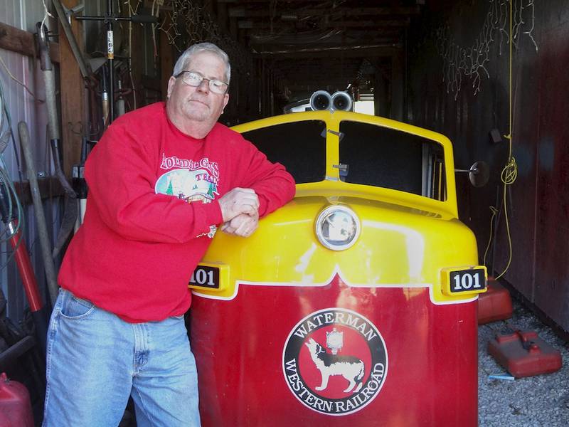 Shaw Local file photo – Pete Robinson, Waterman village president, shown here in this file photo with parts of a holiday train from the Waterman Western Railroad.