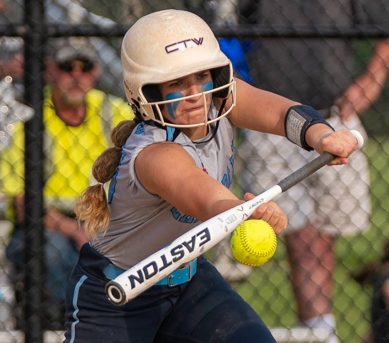Lake Park's Lindsey Onnezi (56) lays down a bunt driving in a run against St. Charles North during a softball game at St. Charles North High School on Wednesday, May 11, 2022.