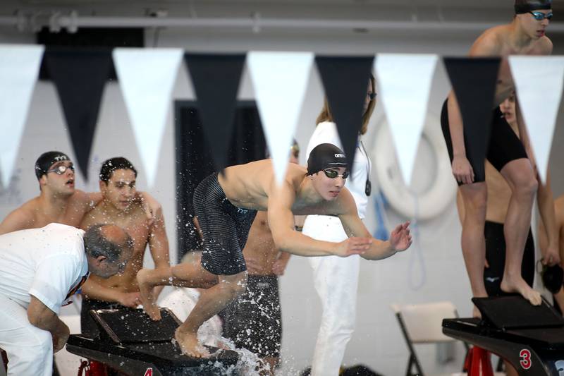 Hinsdale Central’s Matthew Vatev dives in for the freestyle leg of the 200-meter medley relay championship heat during the IHSA Boys State Championships on Saturday, March 1, 2025 at the FMC Natatorium in Westmont.