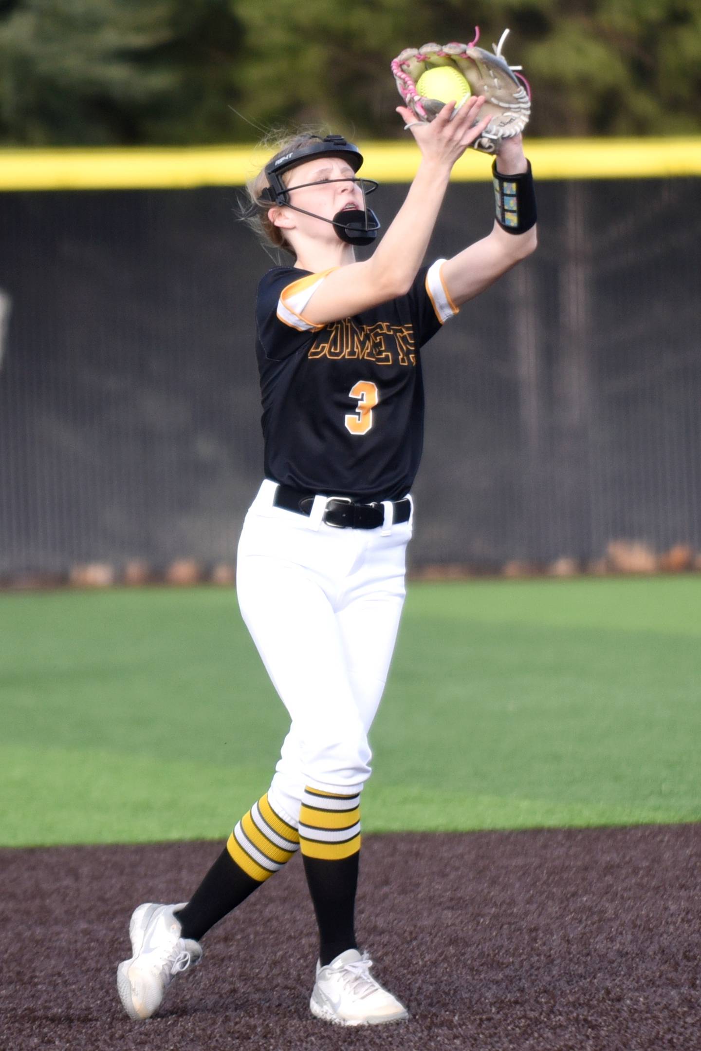 Reed-Custer's Kamryn Wilkey catches a pop up during a game against Beecher Friday, March 28, 2025 at Reed-Custer.