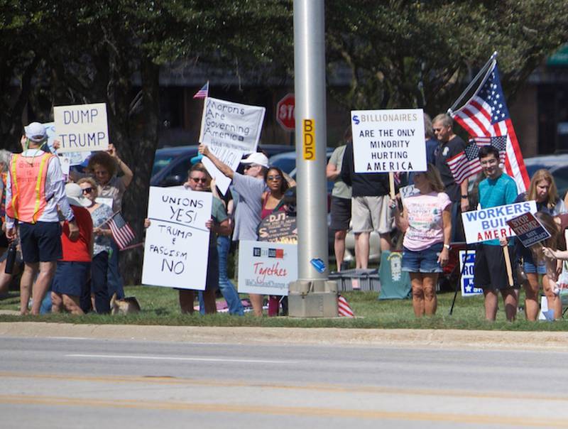 Locals gather for Workers over Billionaires rally on Rt 64 on Monday, Sept.1,2025 in St. Charles.