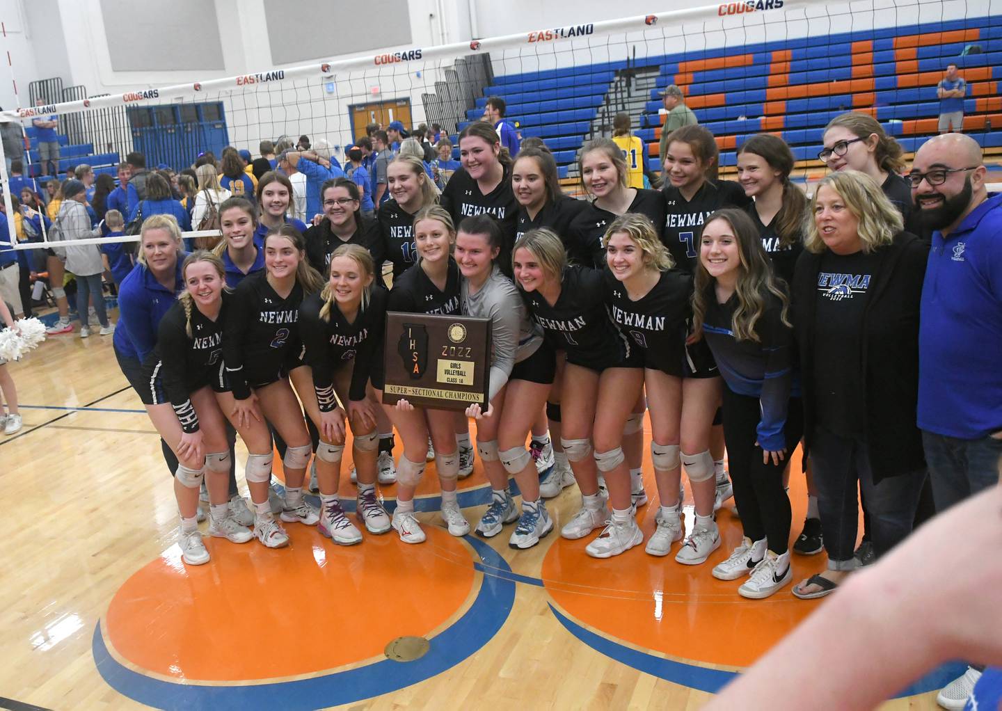 Newman players pose with their plaque after winning the 1A Eastland Supersectional in Lanark on Friday, Nov.4. Newman won the match to advance to the state finals next week.