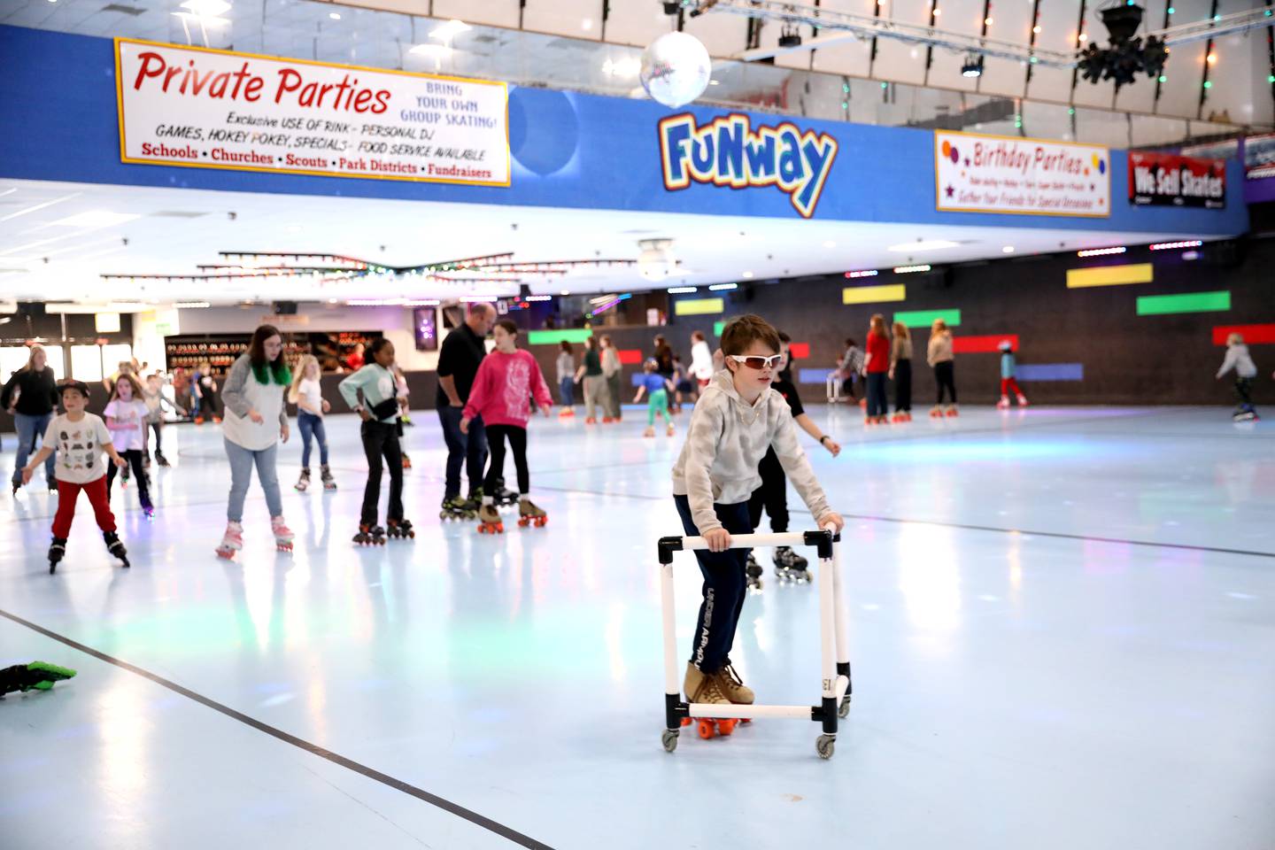 Rollerskaters take to the rink during a winter break open skate session at Funway in Batavia.