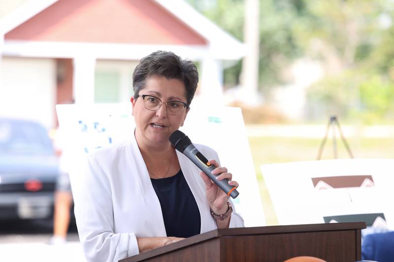 State Rep. Jackie Haas speaks during the West Harbor Residences ribbon cutting and street dedication ceremony on Wednesday, July 23, 2025.