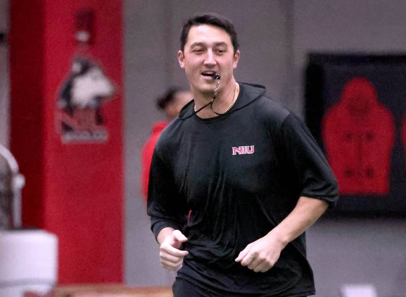 New Northern Illinois offensive coordinator Quinn Sanders runs a drill during the first spring football practice Thursday, March 27, 2025, in the Chessick Practice Center at NIU in DeKalb.