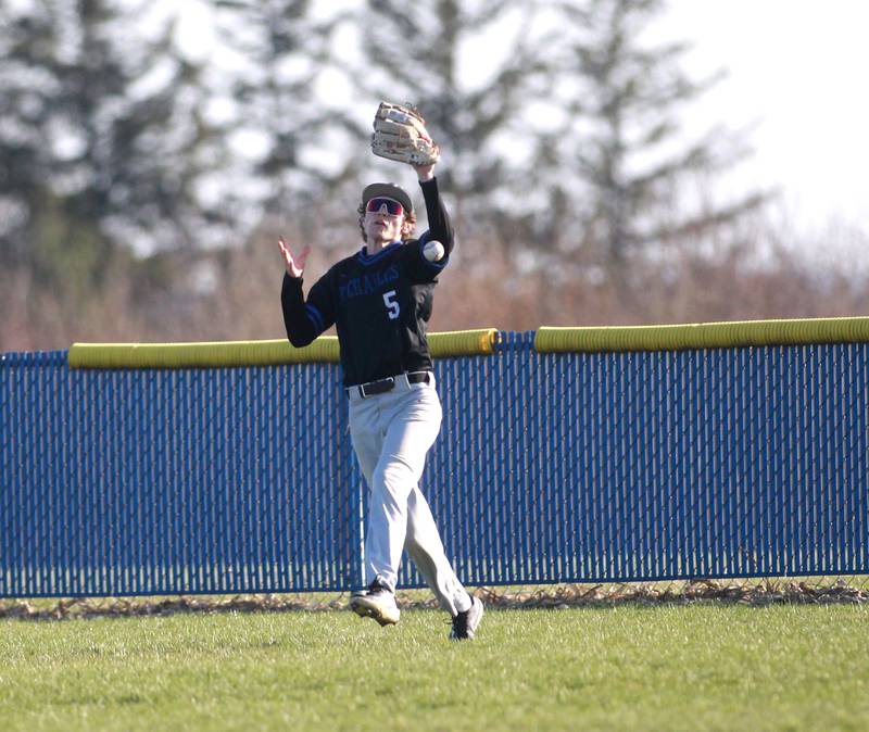 St. Charles North’s Julian Harmon bobbles the ball in center field during a game on Tuesday, April 8, 2025 at Burlington Central.