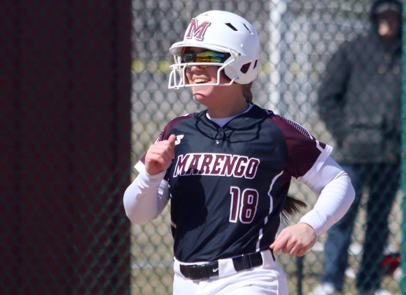 Marengo’s  AJ Pollnow rounds the bases after belting a grand slam against North Boone in varsity softball at Marengo High School in Marengo on Saturday, March 22, 2025.