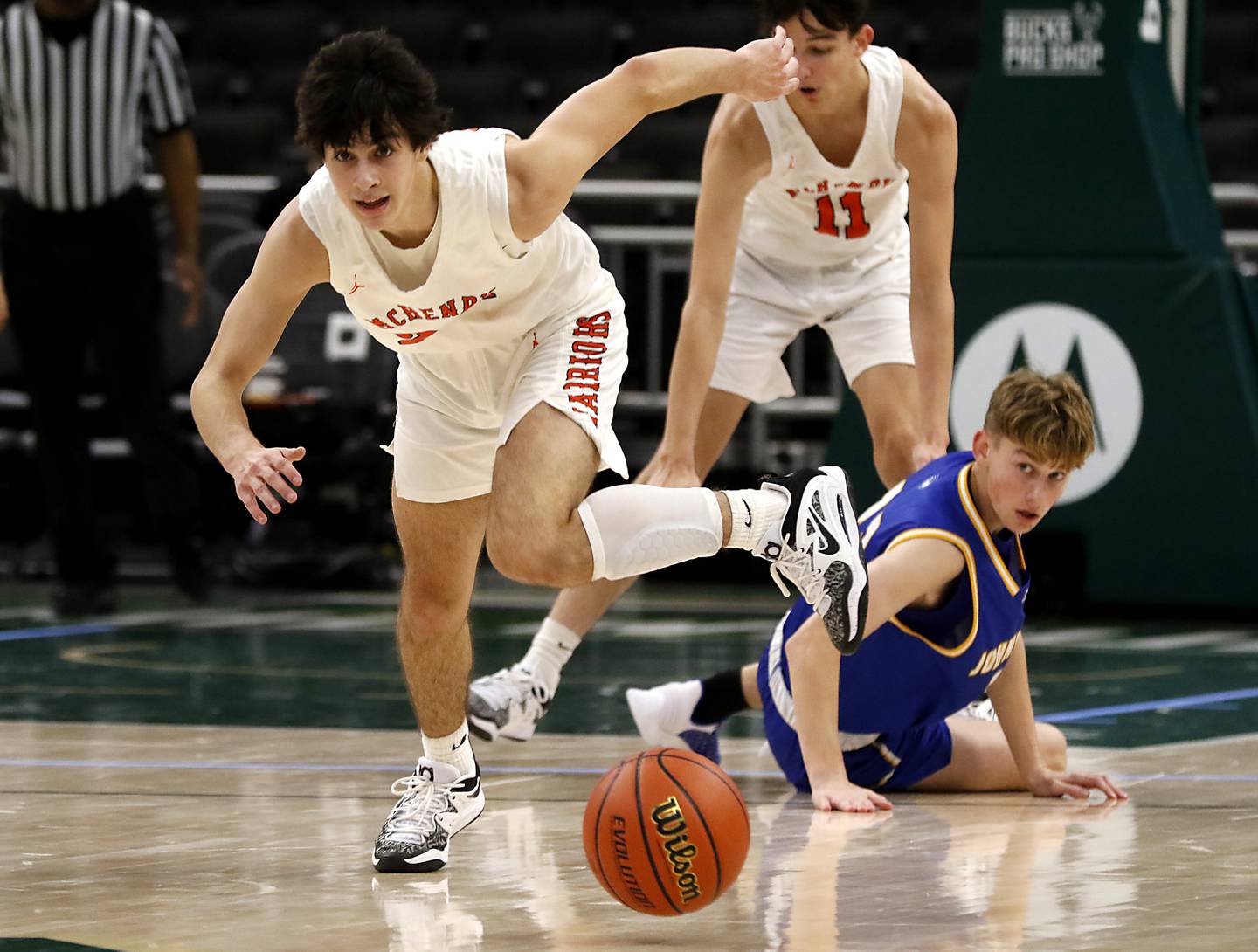 McHenry's Marko Visnjevac chases down a loose ball during a non-conference basketball game Sunday, Nov. 27, 2022, between Johnsburg and McHenry at Fiserv Forum in Milwaukee.