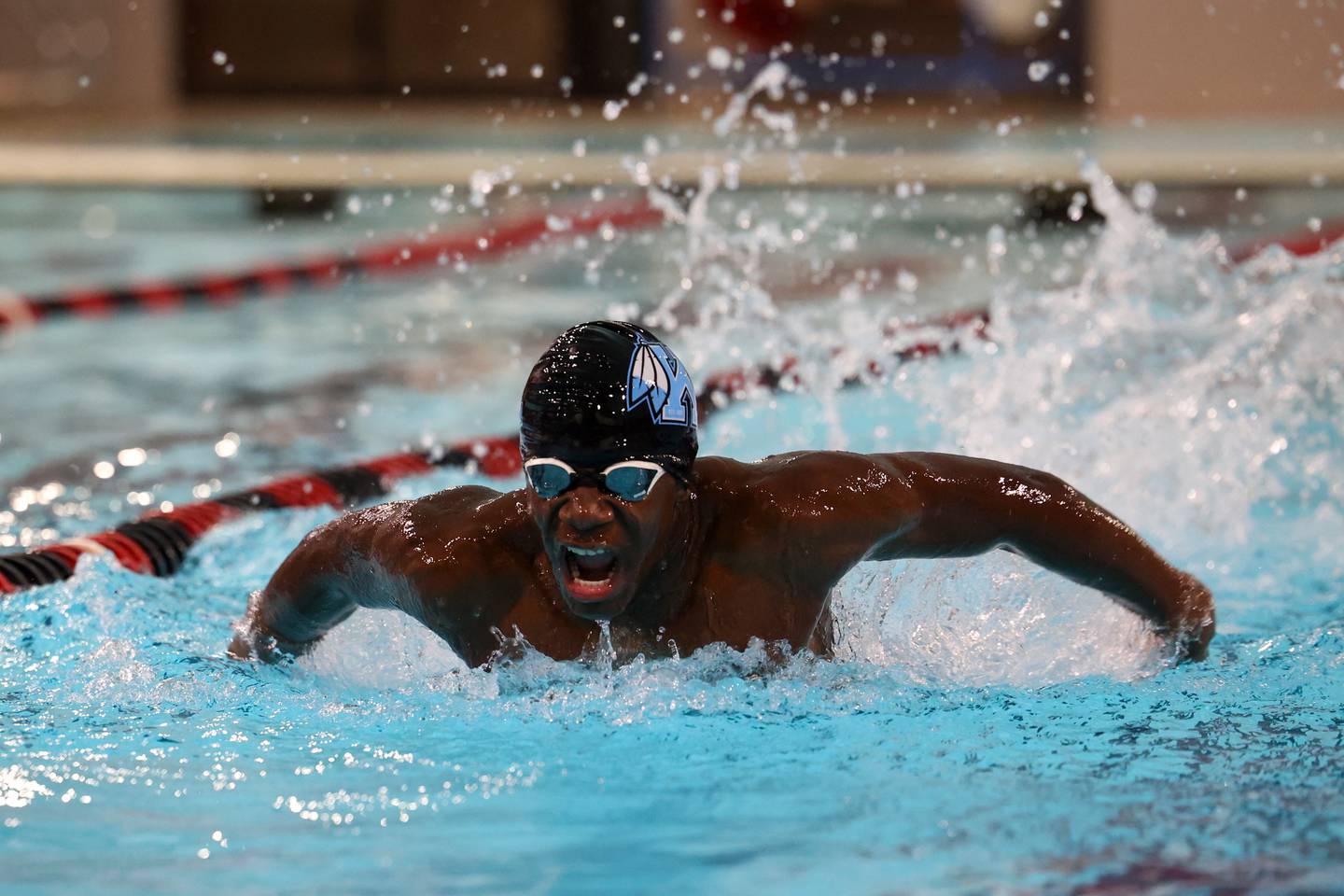 Kankakee's Rahman Lawal competes in the 100-yard butterfly race during the All-City meet on Tuesday, Jan. 6, 2026.