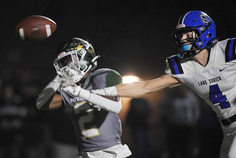 Lake Zurich’s Nolan Siko breaks up a pass in the end zone to Stevenson’s Armand Burris in a football game in Lincolnshire on Friday, September 8, 2023.