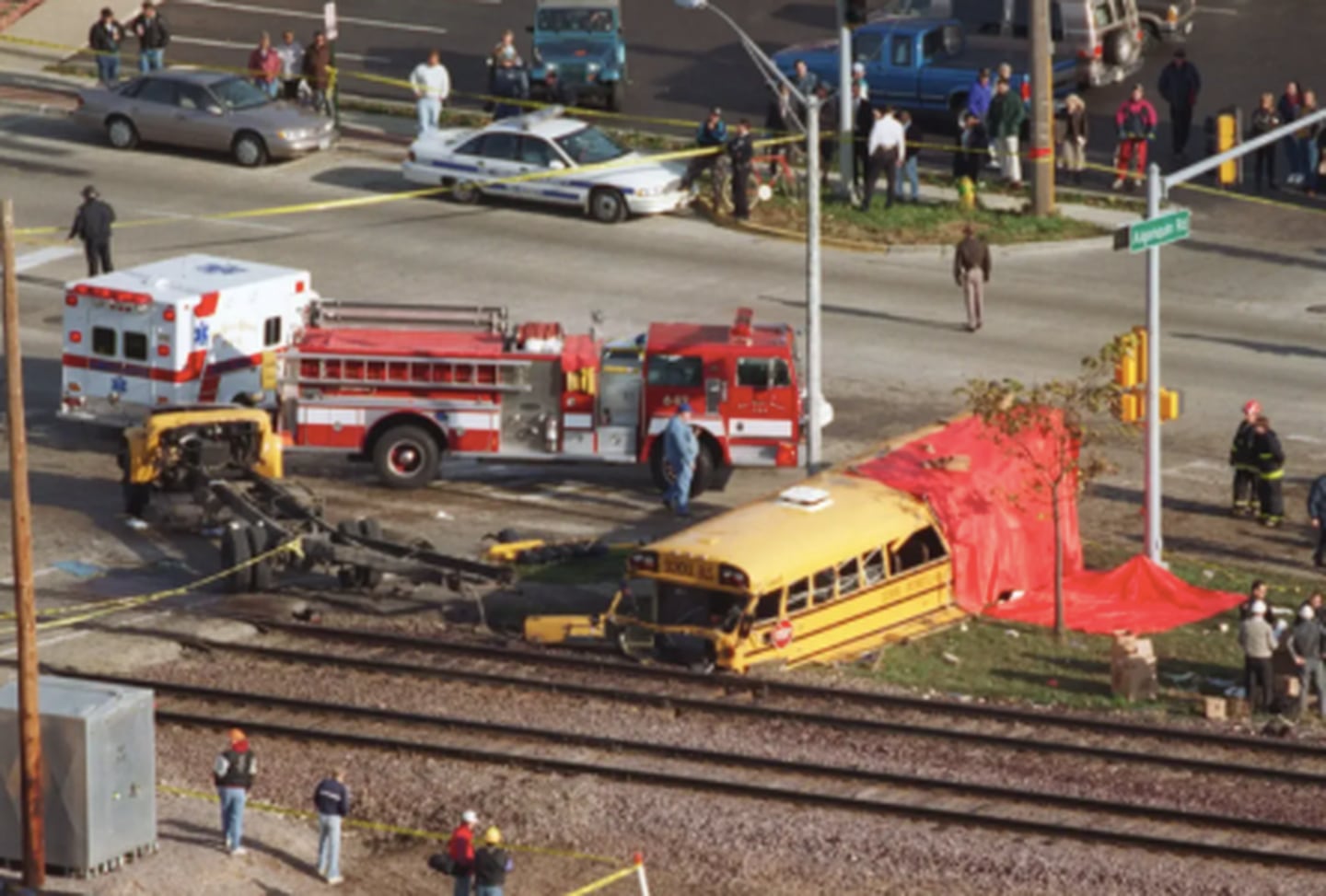 First responders arrived to a deadly crash scene the morning of Oct. 25, 1995, after a train struck a school bus in Fox River Grove. A memorial for the seven Cary-Grove High School students who died now marks the location at Algonquin Road and Northwest Highway.