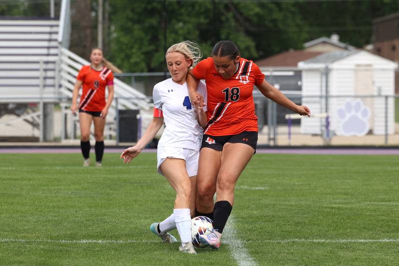 Peotone's Allie Werner and Beecher's Abby Corral collide during Peotone's 2-1 victory over Beecher in the Class 1A Manteno Regional championship on Friday, May 22, 2026.