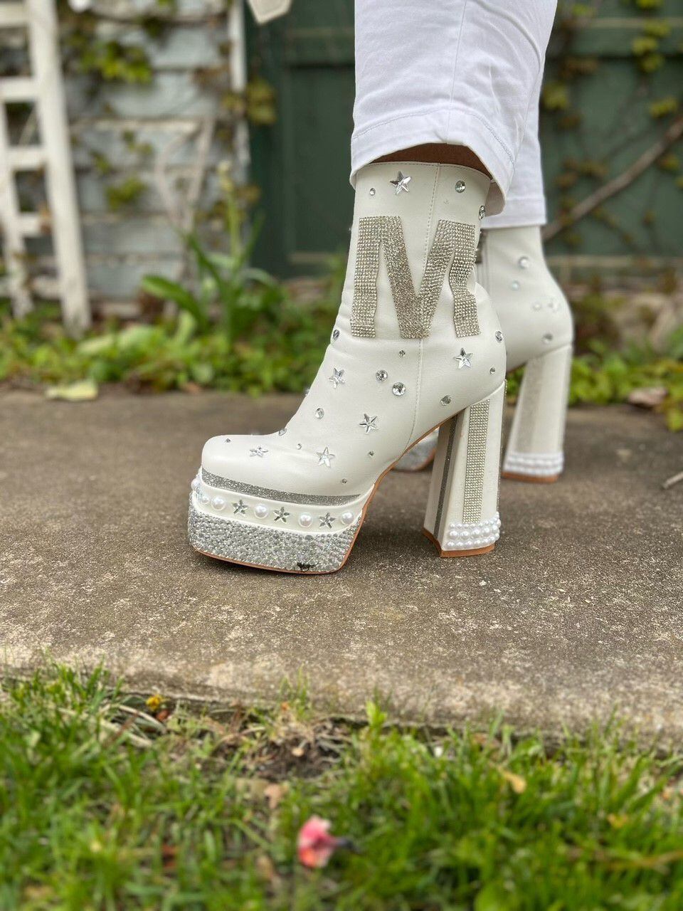 Abbi  O'Malley spent hours gluing the rhinestones and pearls onto the boots to complete her brother Max Wertz's prom night look.