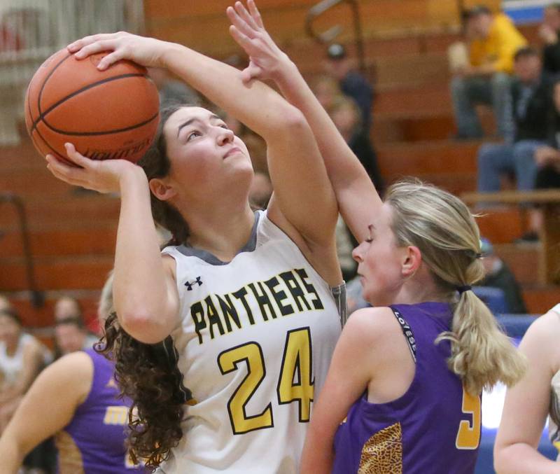Putnam County's Maggie Richetta shoots a jump shot over Mendota's Bria Frey during the Princeton High School Lady Tigers Holiday Tournament on Tuesday, Nov. 14, 2023 in Prouty Gym.