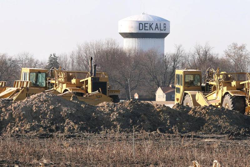 Crews work on behalf of the Krusinski Construction Company Tuesday at the ChicagoWest Business Center in DeKalb, preparing the site for building to begin on a facility for an unnamed international confectioner.