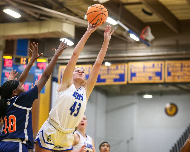 Lyon's Emma O"brien (43) puts up a shot during their Class 4A Lyons Sectional semifinal basketball game between Lyons vs Young. Feb 25, 2025 in La Grange.