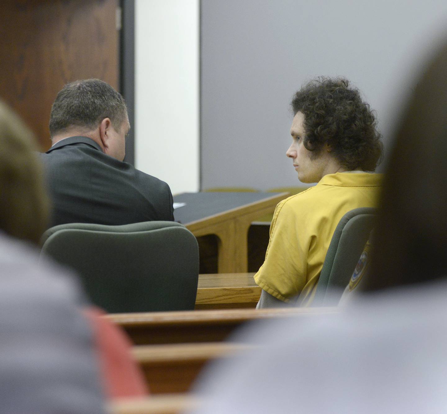 Donald Fredres (right) speaks to Ottawa defense attorney Ryan Hamer during his Friday, July 1, 2022, sentencing hearing for the double murder of his former-in laws. Fredres was sentenced to life, plus 26 years.