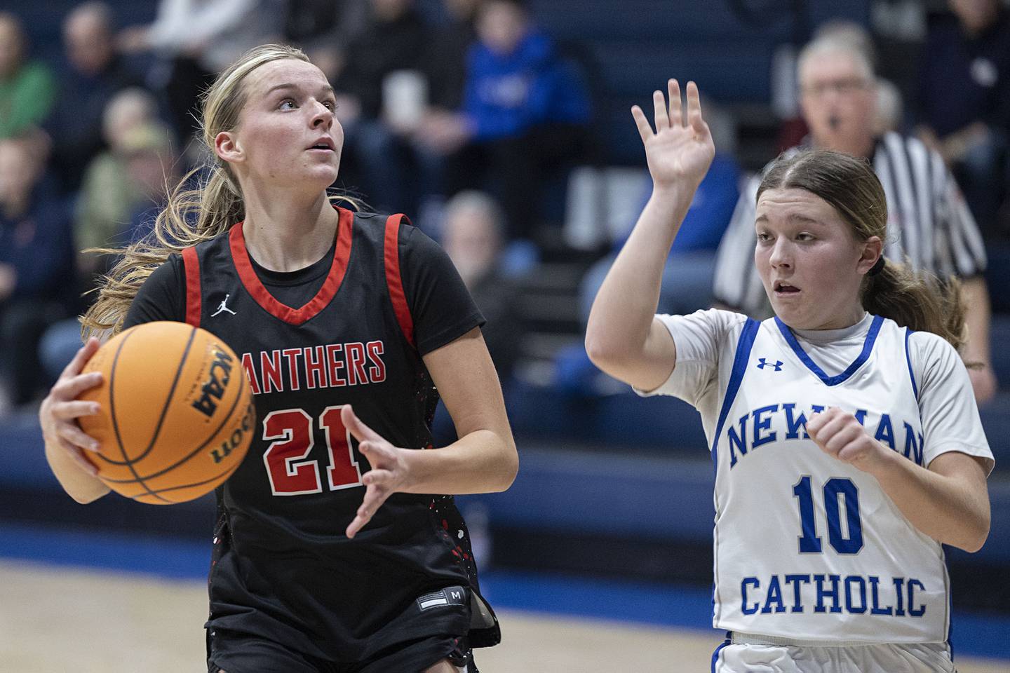 Erie-Prophetstown’s Aubrey Huisman looks to shoot against Newman’s Elaina Allen Thursday, Jan. 29, 2026.