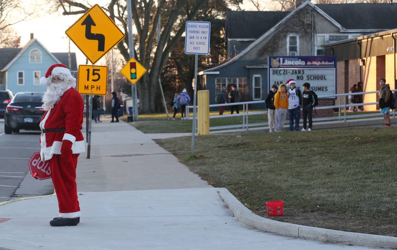 Santa Claus came to Lincoln Junior High School to be the crossing guard on Wednesday, Dec. 20, 2023 in La Salle. Santa came to the school to assist students as the crossing guard for the morning and spread holiday cheer to all.